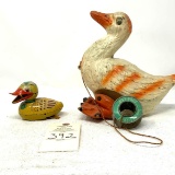 Two antique duck toys