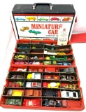 Vintage miniature car carrying case and cars