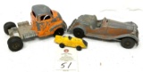 Three vintage toy cars and truck