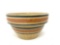 Antique crock bowl with blue and pink lines