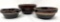 Three antique brown crock bowls
