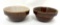 Two antique brown crock bowls