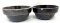 Two antique brown crock bowls