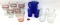 Vintage shot glasses and a small blue pitcher and glasses