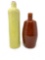 Two vintage crock bottles