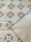 Green and orange quilt