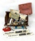 Vintage wooden box with symbols, pin cushions, and misc. buttons