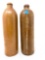 Two antique crock jugs/bottles