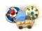 Vintage tin doll buggy and two spinning tops