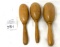 Three antique egg shaped sock darner