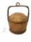 Antique woven basket with handle