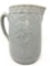 Antique stoneware grey pitcher with flower design