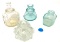 Four vintage clear and blue glass inkwells