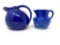Two vintage blue creamers
