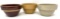 Three antique crock bowls