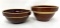 Two antique brown crock bowls