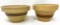 Two antique crock bowls with brown lines