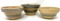 Three antique crock bowls with blue lines