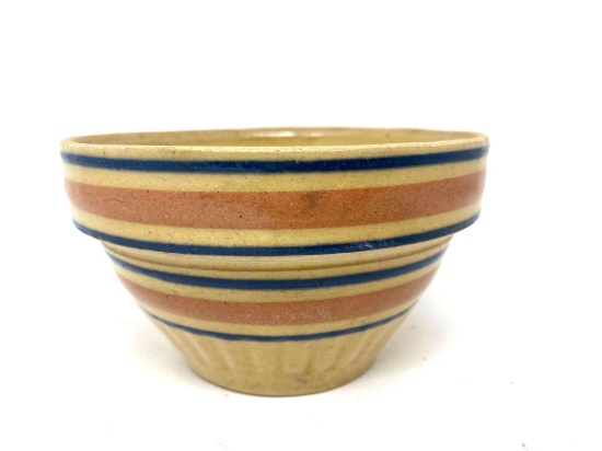Antique crock bowl with blue and pink lines