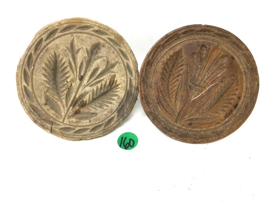 Two antique butter presses