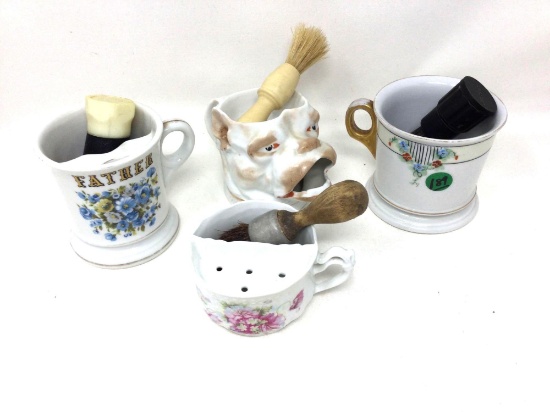 Four vintage shaving mugs and brushes