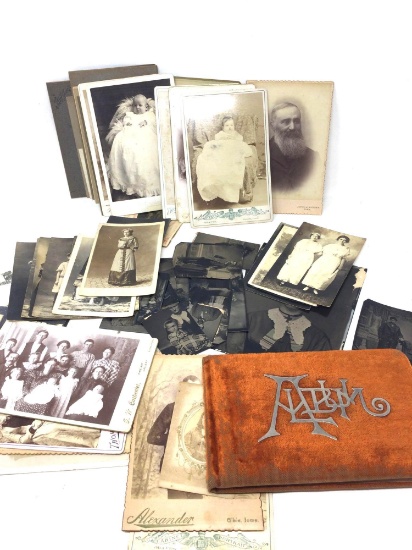 Antique photographs some on tin and photo album from 1895 (empty)