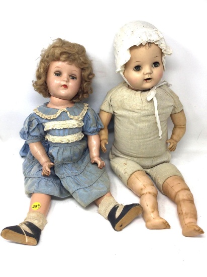 Two antique moving eye dolls