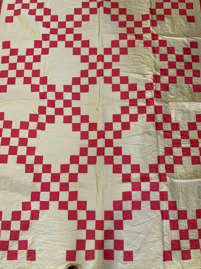 Pink and white block quilt
