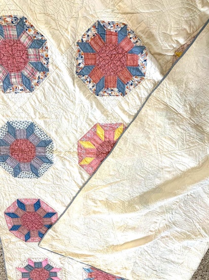 Pink and blue hand quilted quilt