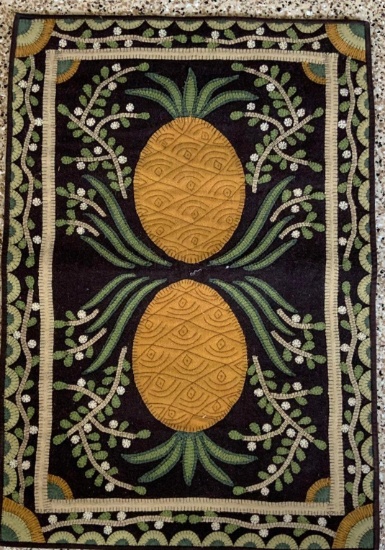 Hand stitched rug with pineapple design