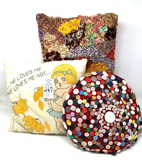 Three vintage pillows