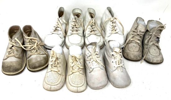 Six pair of vintage child"s shoes