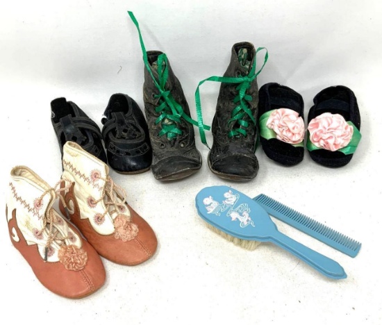 Antique and vintage children"s shoes, brush and comb