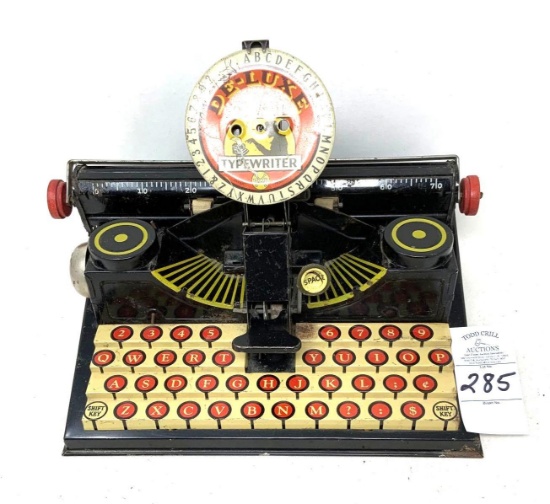 Antique De-Luxe dial typewriter