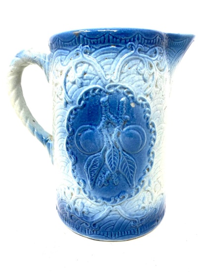 Vintage blue and white stoneware pitcher with fruit