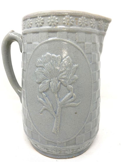 Antique stoneware grey pitcher with flower design