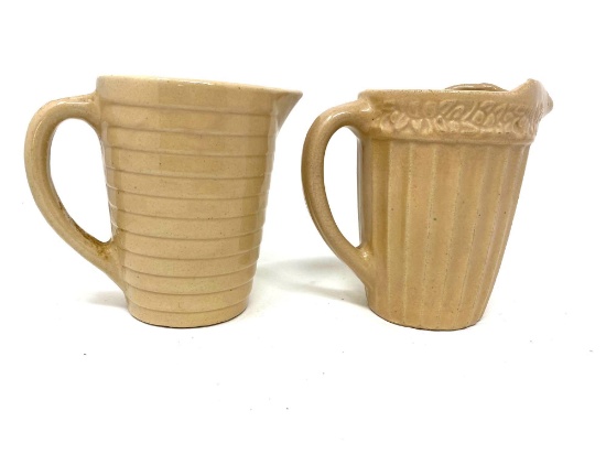 Two antique stoneware pitchers