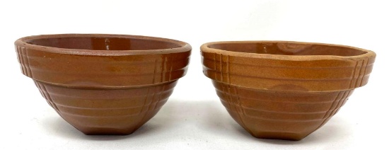 Two antique brown crock bowls