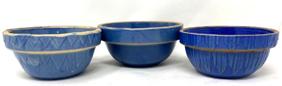 Three antique blue crock bowls