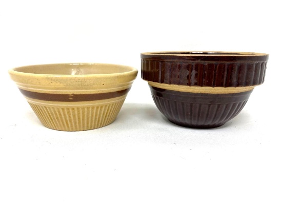 Two antique brown and tan crock bowls
