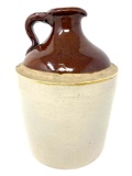 Antique brown and white crock jug