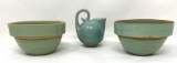 Two green antique crock bowls and a creamer