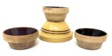 Four antique crock bowls