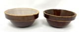 Two antique brown crock bowls