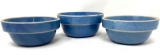 Three antique blue crock bowls
