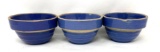 Three antique USA blue crock bowls