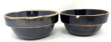 Two antique brown crock bowls