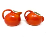 Vintage orange ceramic creamer and sugar