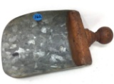 Antique wooden handled tin flour scoop