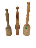 Three primitive antique wooden potato masher prestles